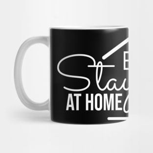 stay at home text with a home icon Mug